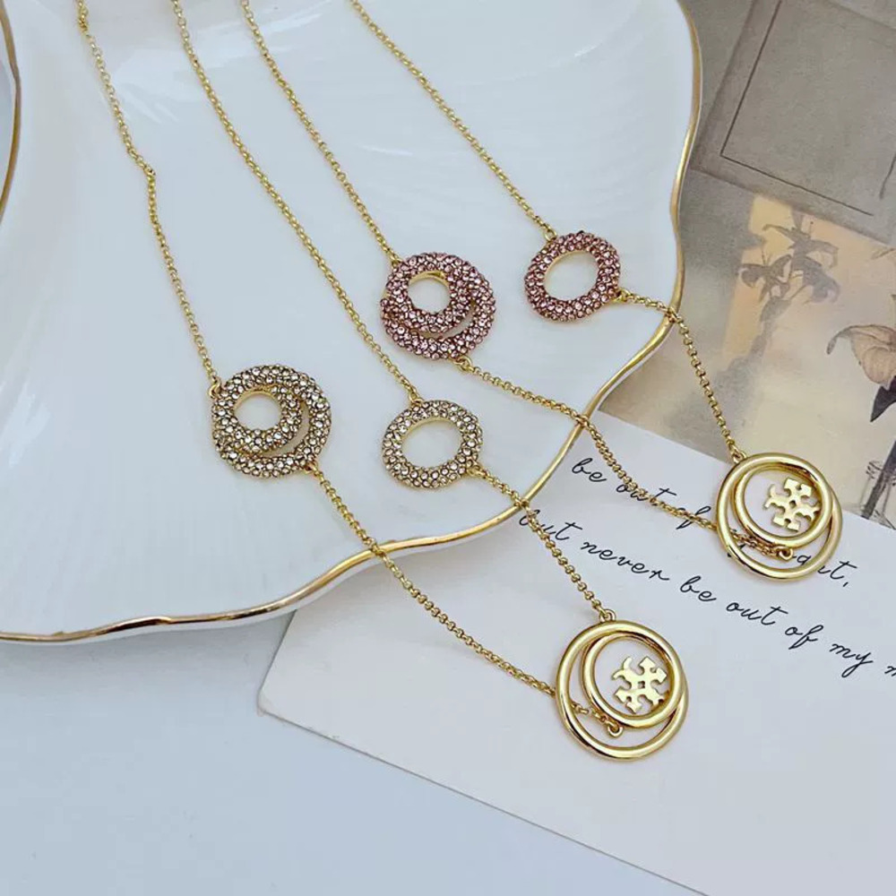 Tory Burch Rhinestone Round Metal Necklace